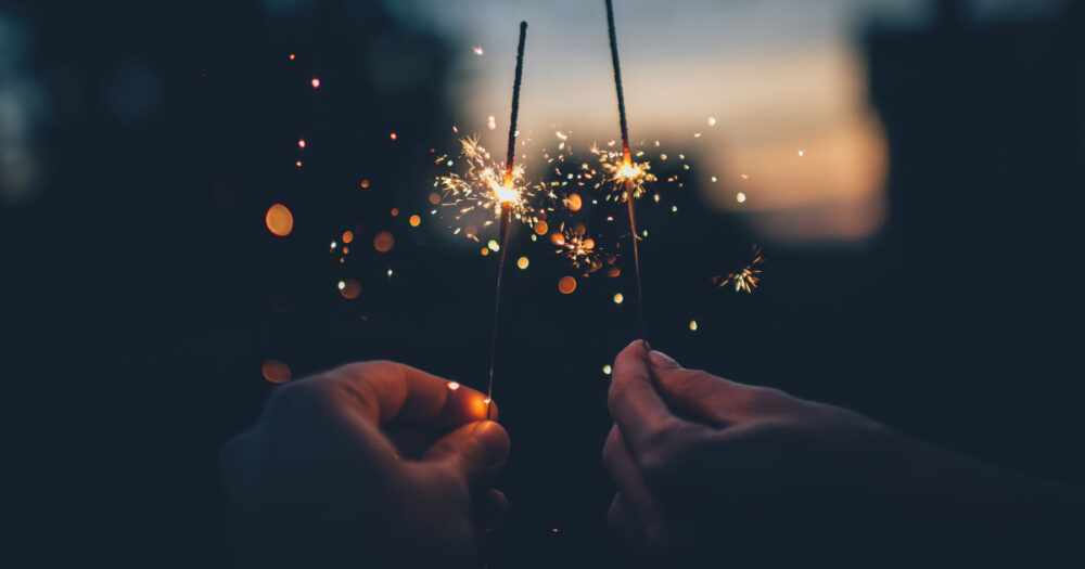 sparklers in hands